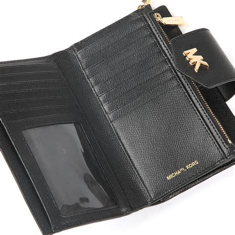 snap wristlet michael kors|michael kors wallet with strap.